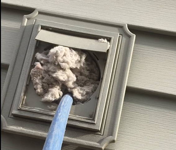 removing lint from a clogged dryer vent